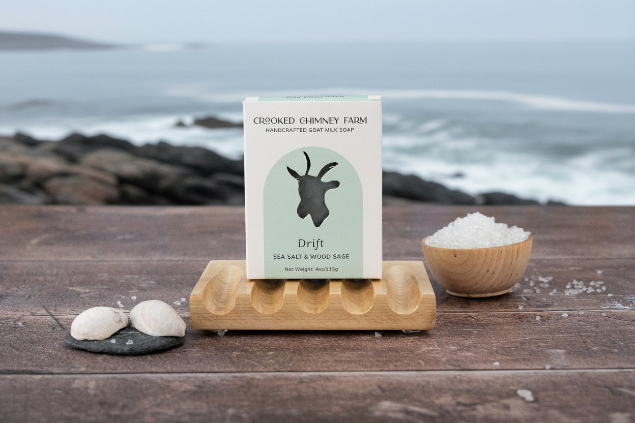 drift soap in box on table with maine coast in background